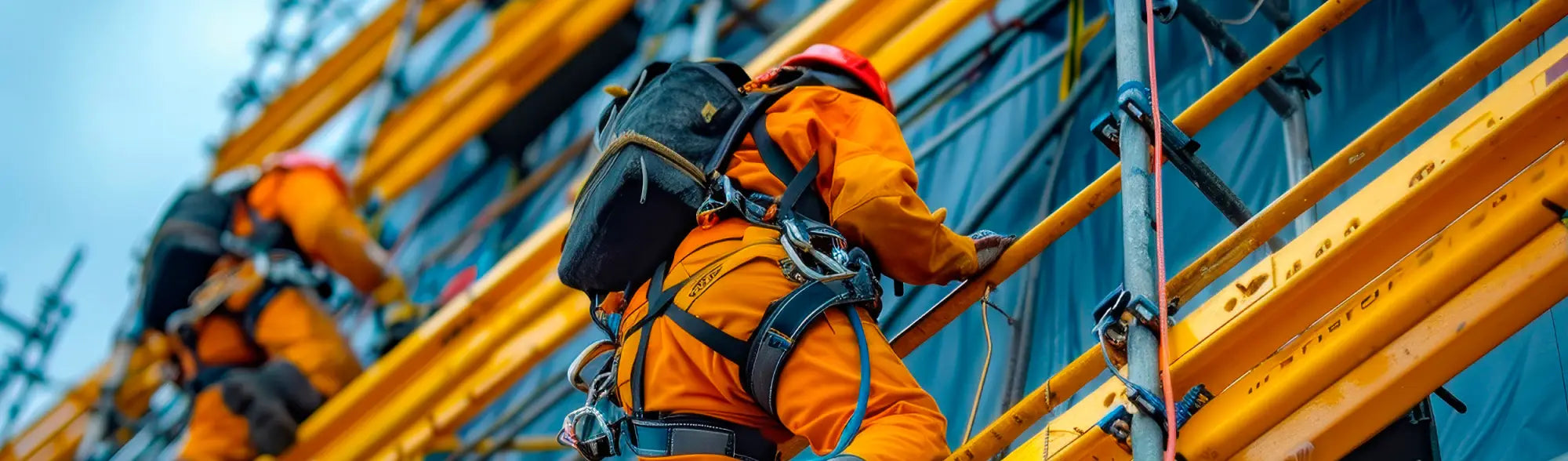 Construction workers climbing scaffolding for workplace hygiene with PPE Confined Space Entry