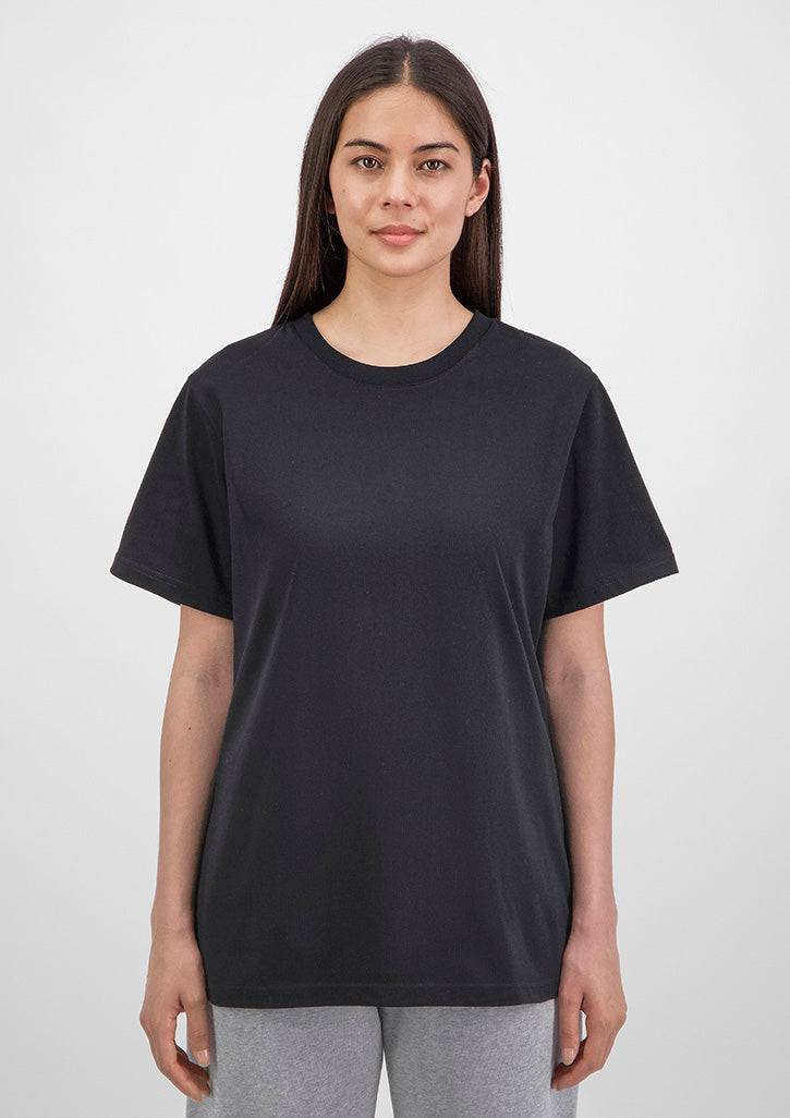 Person wearing a black t-shirt against a white background
