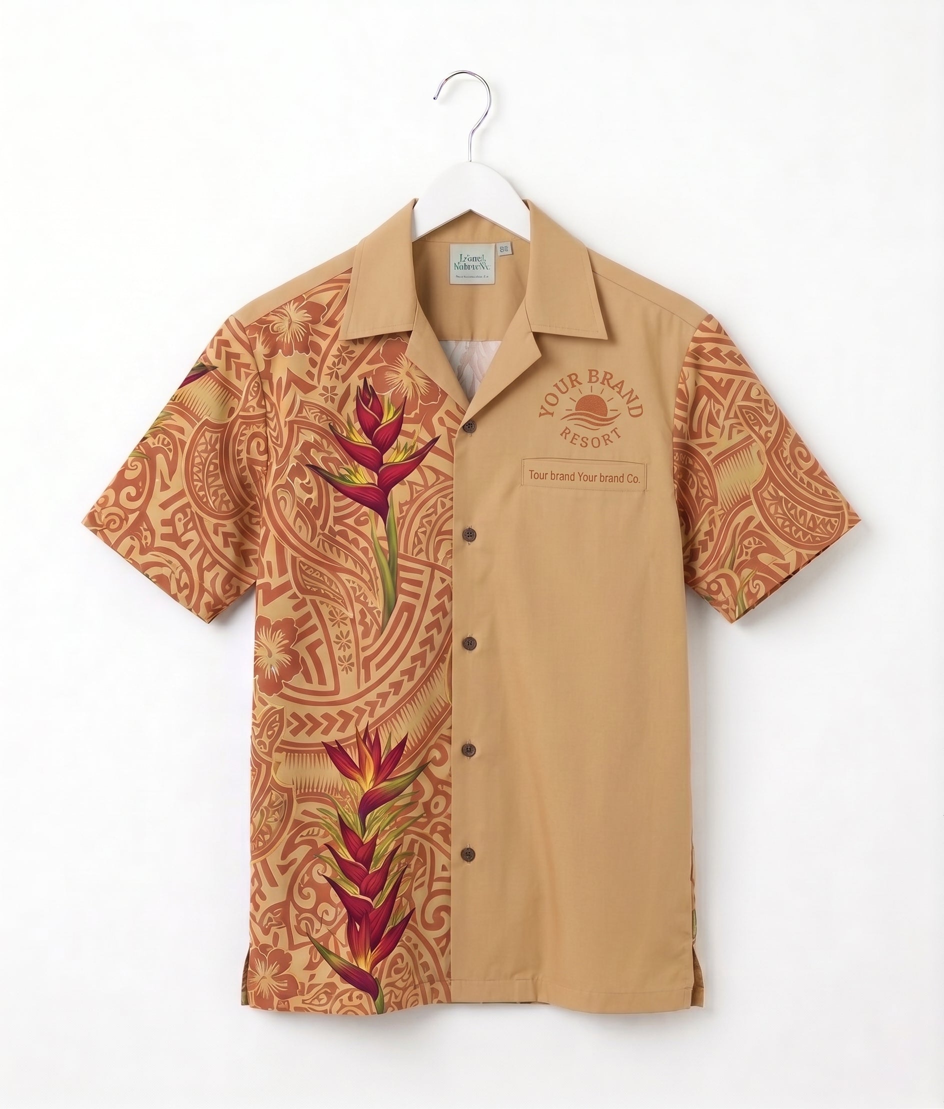 A short-sleeve button-up camp shirt hanging on a white hanger against a white background. The shirt features a split design: one side is solid tan with a small chest graphic reading 'YOUR BRAND FASHION', while the other side has a brown tribal pattern overlay with large red and green tropical flower prints.