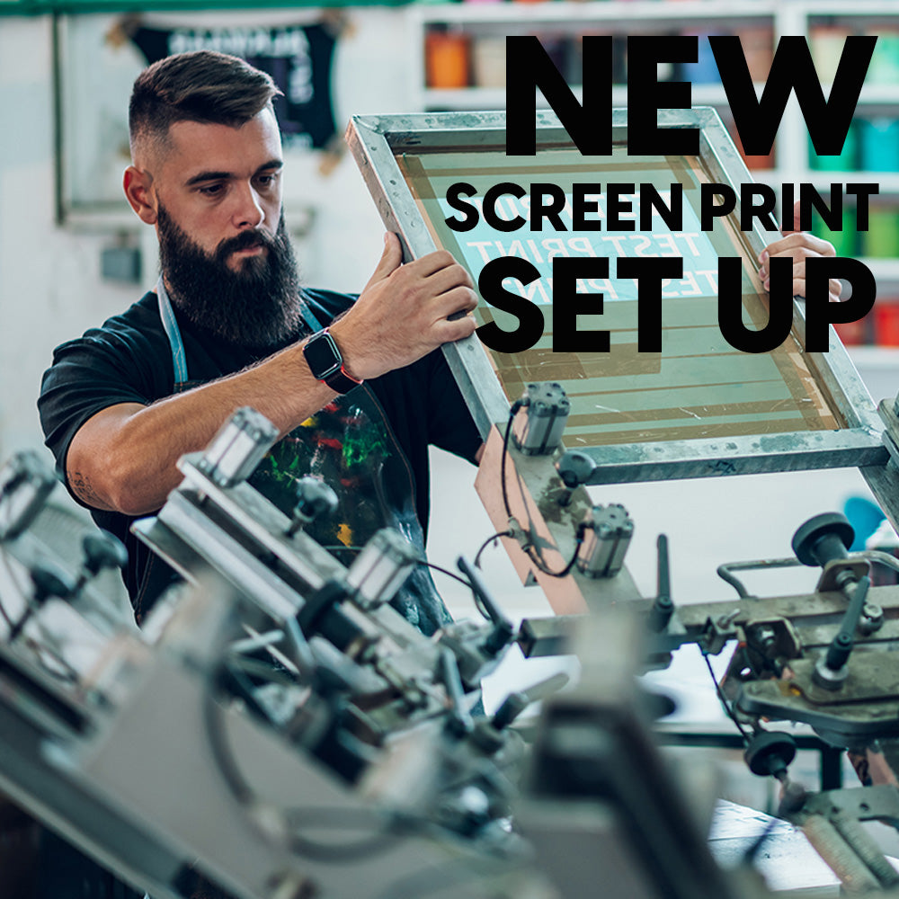 A man holding a worn metal screen printing frame with taut mesh for work uniforms in the brd repeat setup
