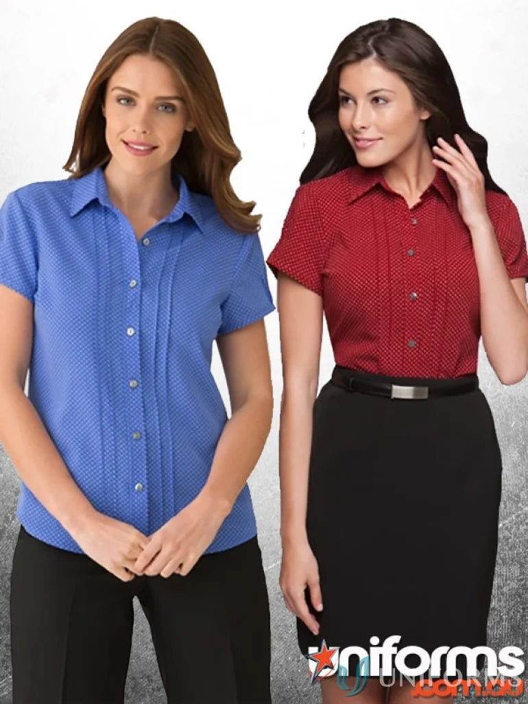 Two women wearing stylish Spot Ladies Cap Sleeve Shirts with natural stretch and easy care