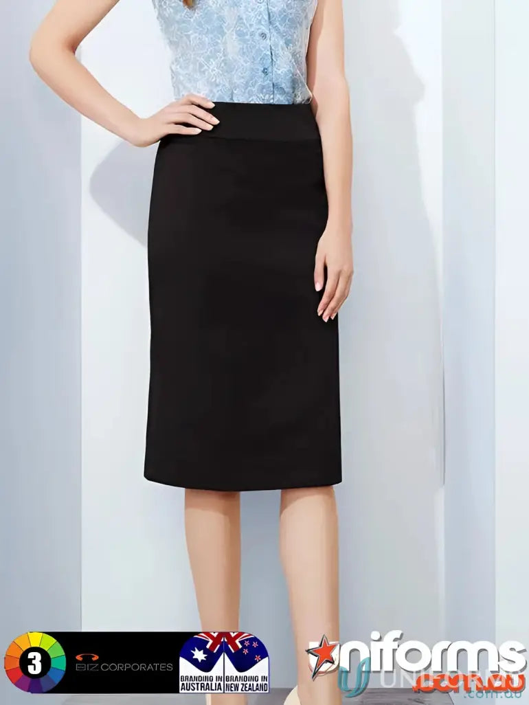 Woman modeling womens cool stretch relaxed fit lined black pencil skirt with blue pattern shirt