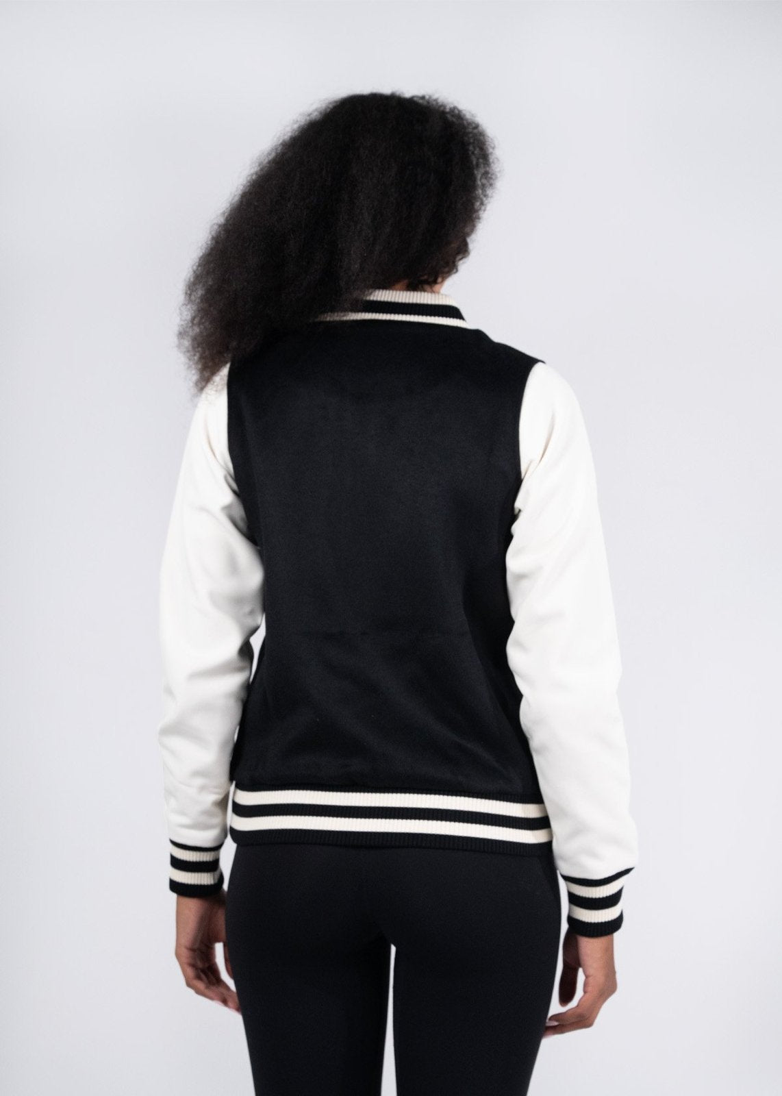 Black and white varsity wool blend ladies jacket with ribbed cuffs collar trim and waistband perfect for workwear uniforms