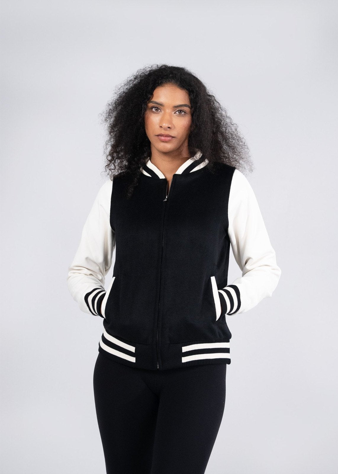 Black and white varsity wool blend ladies jacket with ribbed cuffs collar and hem perfect for work uniforms and workwear