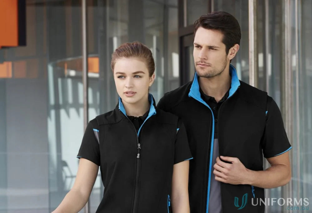 Two guys in black and blue Geneva Softshell Vest from J404M Collection Mens