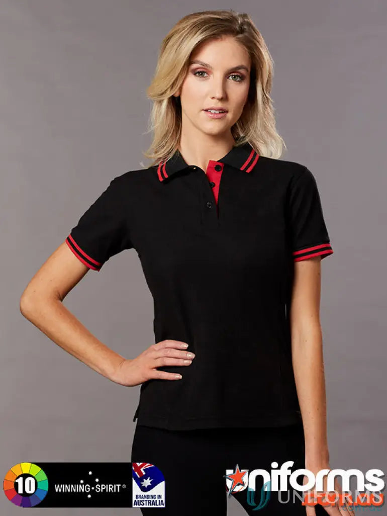 Woman wearing Heart Foundation Ladies Pique Polo with red collar and stripes, perfect for truedry pique style