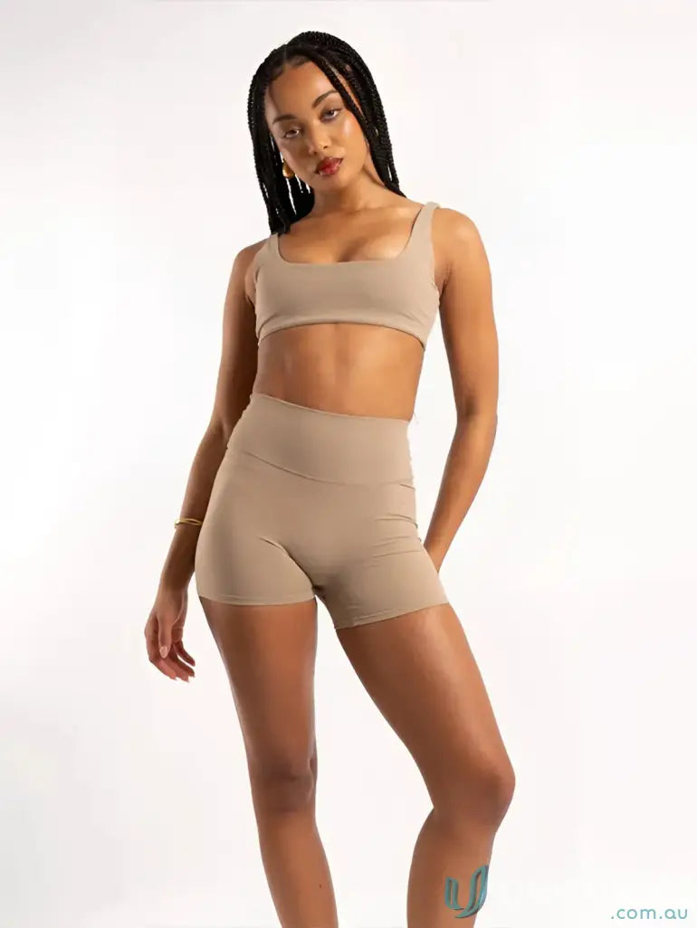Beige high-waisted invisible scrunch latte shorts with seamless fit ideal for comfortable workwear or uniforms