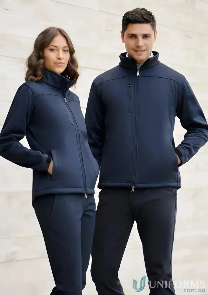 Two guys in navy blue IOP (EMB) Mens Soft Shell Jackets with wind flap and bonded polyester