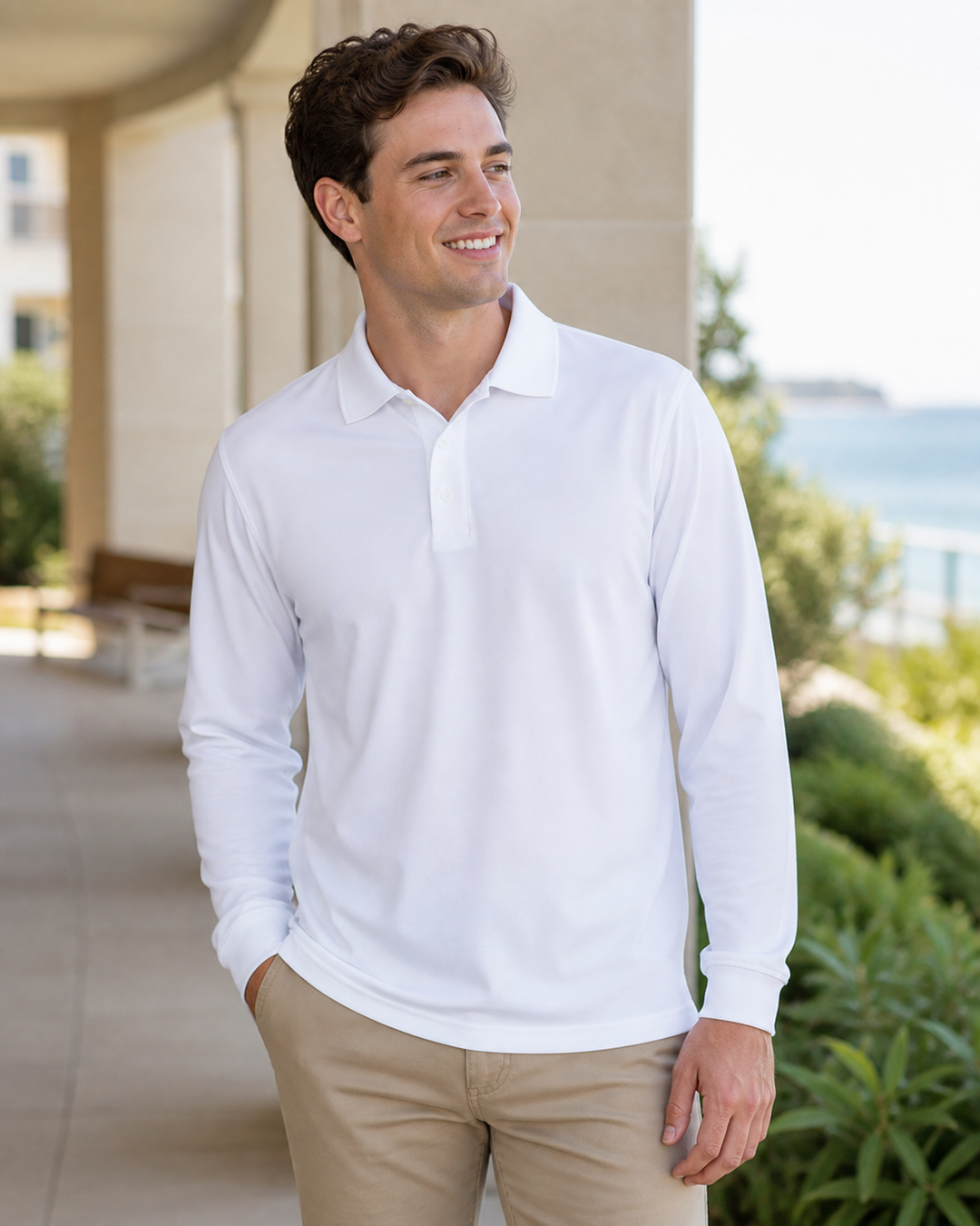 Male model wearing white JB's Podium Adults long sleeve poly polo
