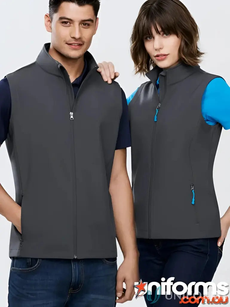 Two people wearing KENNARDS Mens Softshell Vest, perfect for work uniforms and added warmth