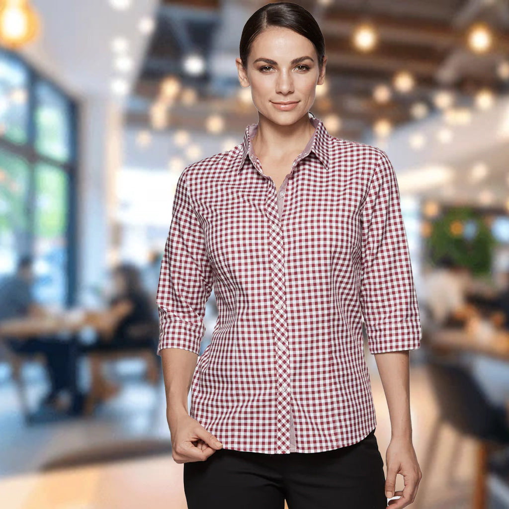 Woman in Brighton lady shirt, red white checkered 3Q sleeves