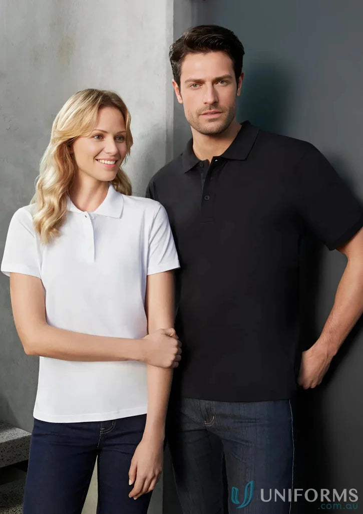 Couple wearing matching black and white cotton ice polo shirts from Biz Collection Womens