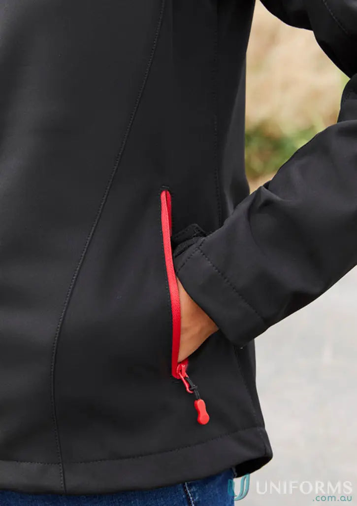 Ladies Geneva Softshell Jacket with black fabric and red zipper for women’s biz collection