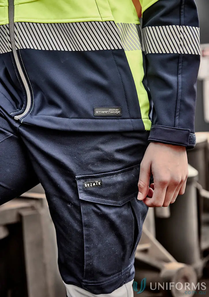 Ladies streetworx navy and yellow stretch softshell jacket with bio motion segmented design