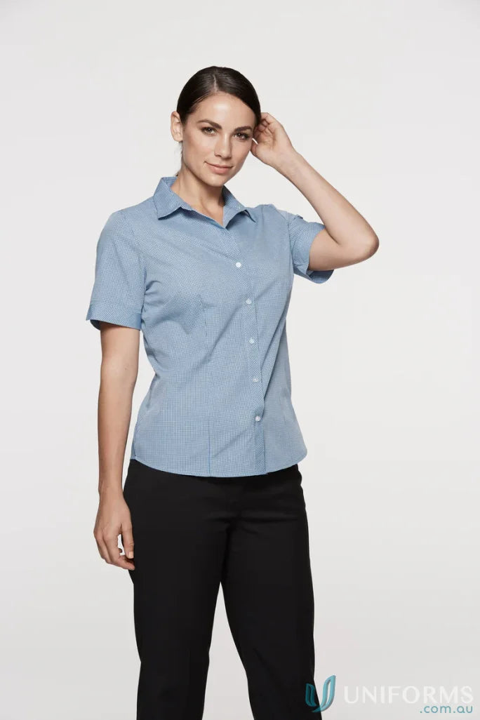 Woman wearing Ladies Toorak S/S Shirt in light blue, perfect workwear or uniforms