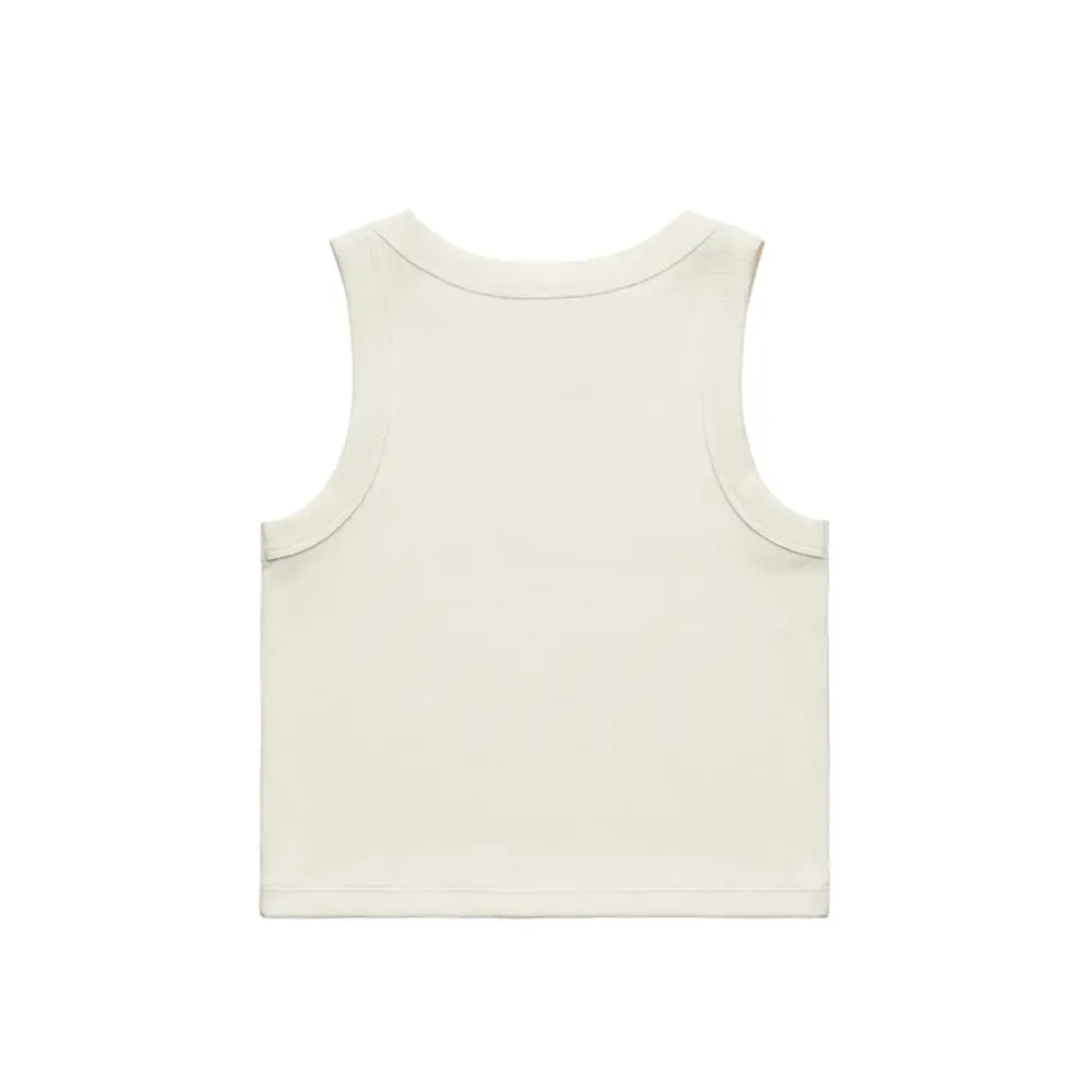 Sleeveless, cream-colored knit top.