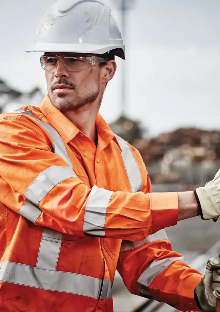 Construction worker in safety gear wearing NSW Rail HiVis BioMotion X Back LS Shirt with taped long sleeve
