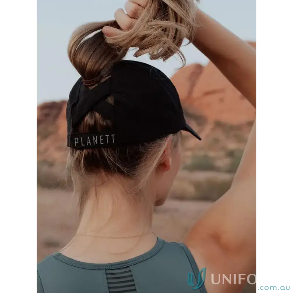 Black women’s Ponytail Active Cap with unique ponytail opening and inbuilt cotton sweatband