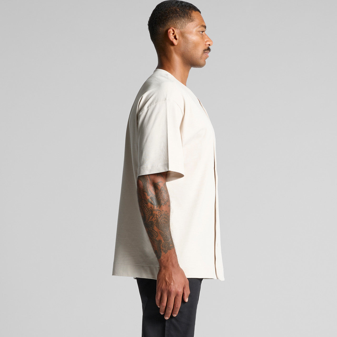 Cream oversized t-shirt with short sleeves and a relaxed fit.
