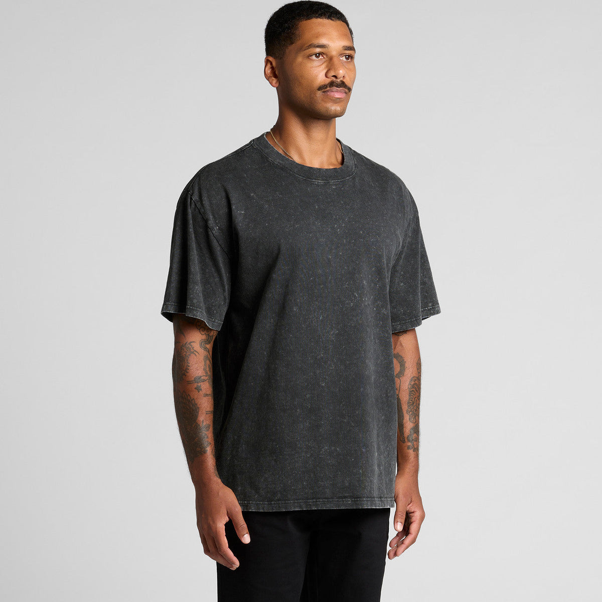 Charcoal distressed oversized t-shirt with a vintage wash design.