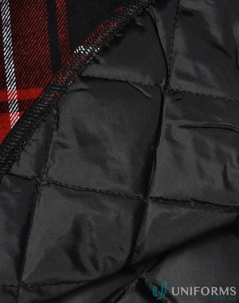Close-up of quilted black lining in red and black plaid quilted flannel jacket shirt style jacket
