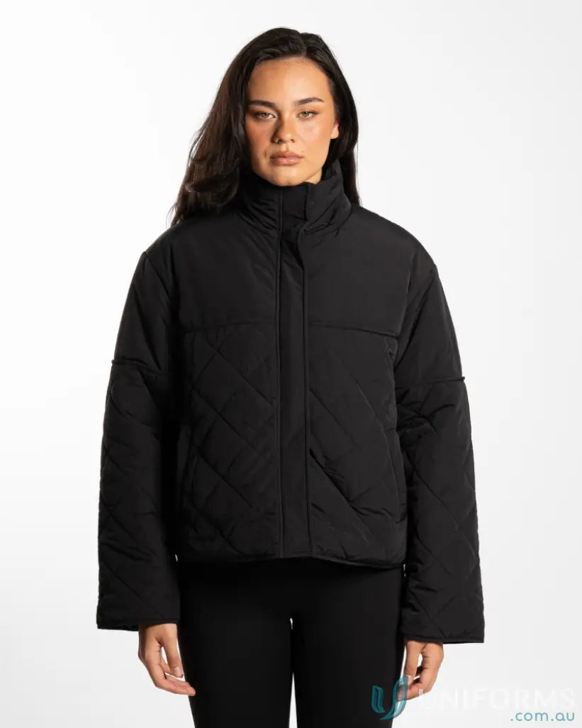 Black puffer jacket with high collar and zipper closure, likely made of synthetic material for warmth.