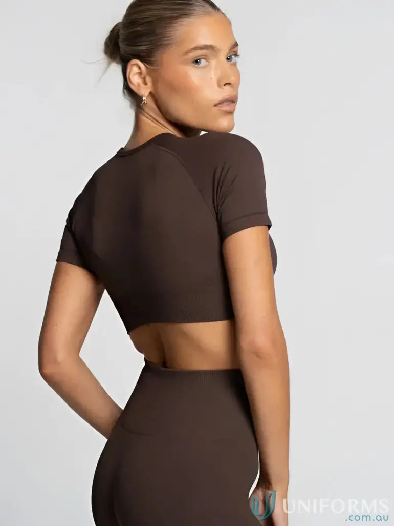 Brown seamless cropped espresso tee showing back cutout perfect for stylish workwear and modern uniforms