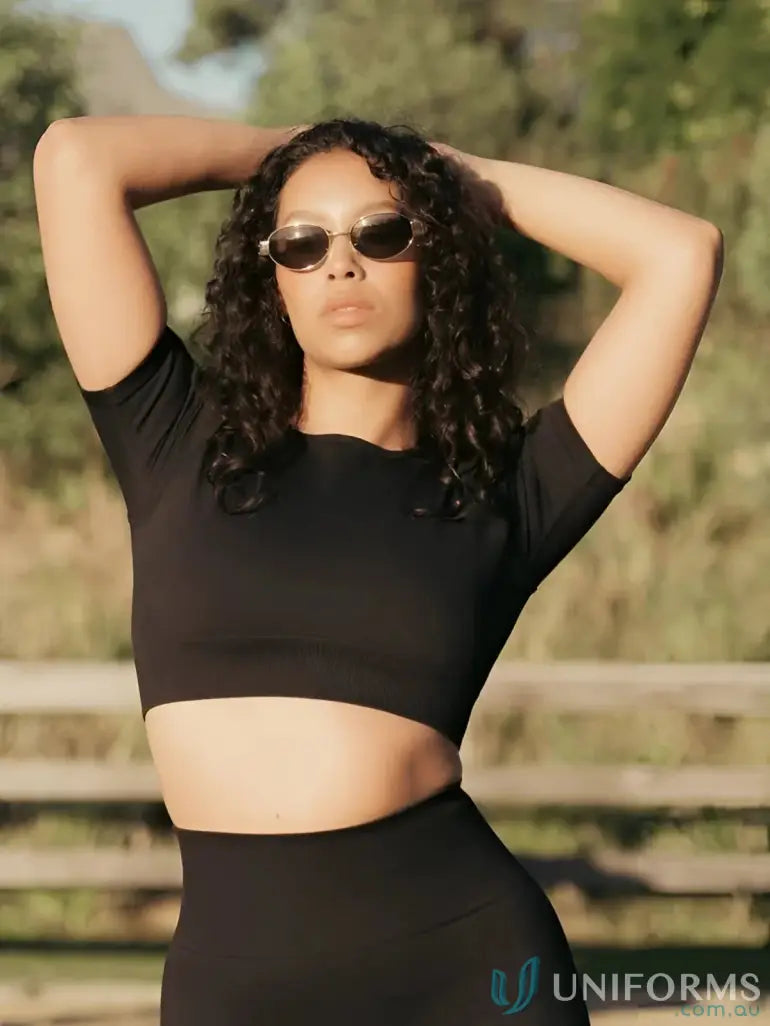 Black seamless cropped onyx tee with high neckline and fitted silhouette perfect for workwear and uniforms