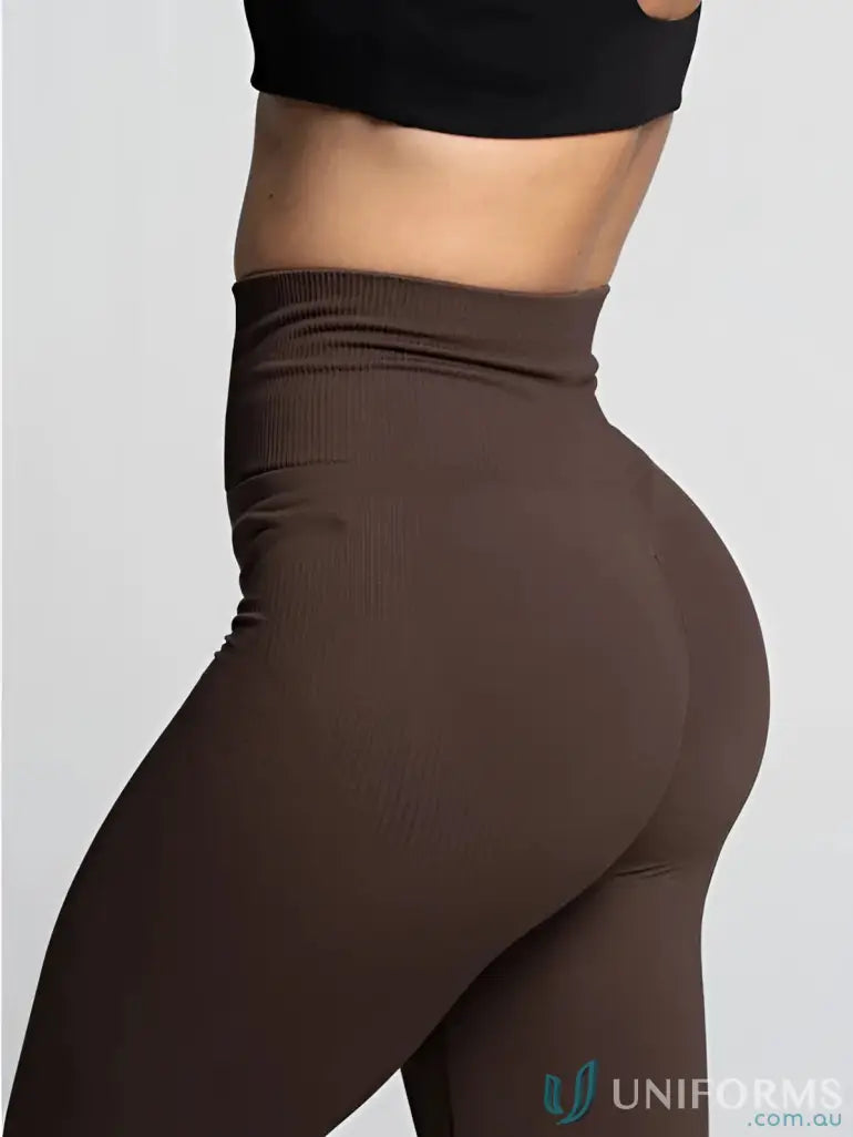 High-waisted brown ribbed seamless invisible scrunch espresso leggings perfect for comfortable workwear uniforms