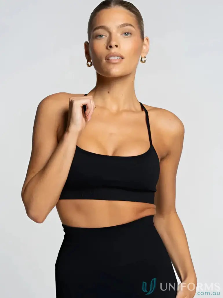 Black stretchy seamless onyx active crop top with thin straps and square neckline perfect for workwear uniforms