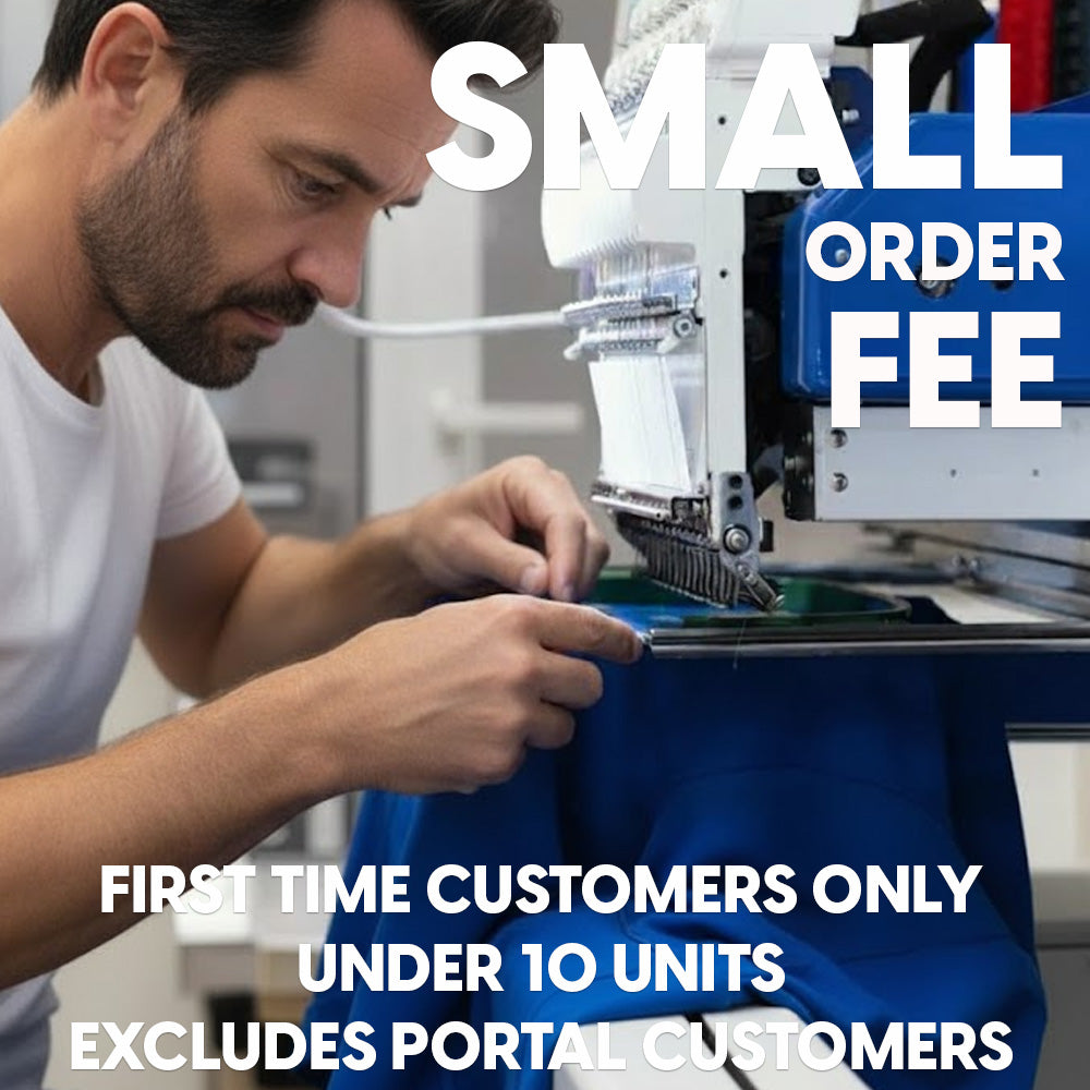 Blue fabric being embroidered by a machine for work uniforms in the brd small order fee product line