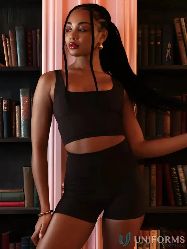 Black sleeveless square neck chocolate tank with stretchy crop top and high-waisted shorts ideal for work uniforms and workwear