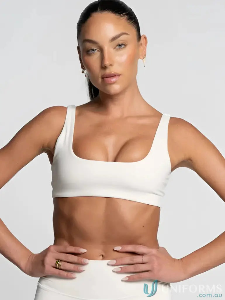 White cropped sports bra with square neck and wide straps ideal for comfy workwear or casual uniforms