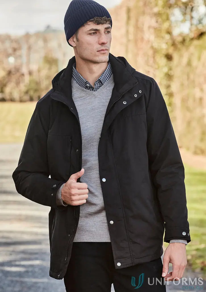 Man in black waterproof jacket and Streetworx Beanie on cold weather days