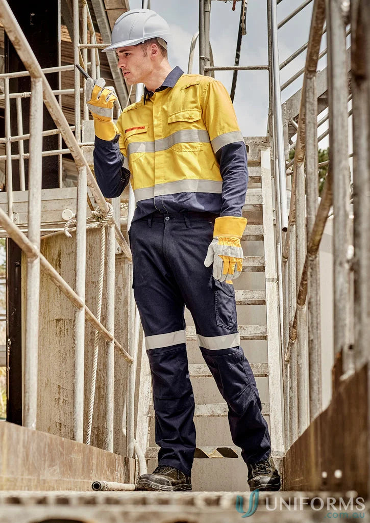 Construction worker in safety gear wearing Syzmic Range Mens Orange Flame Taped Cargo Pant ZP521