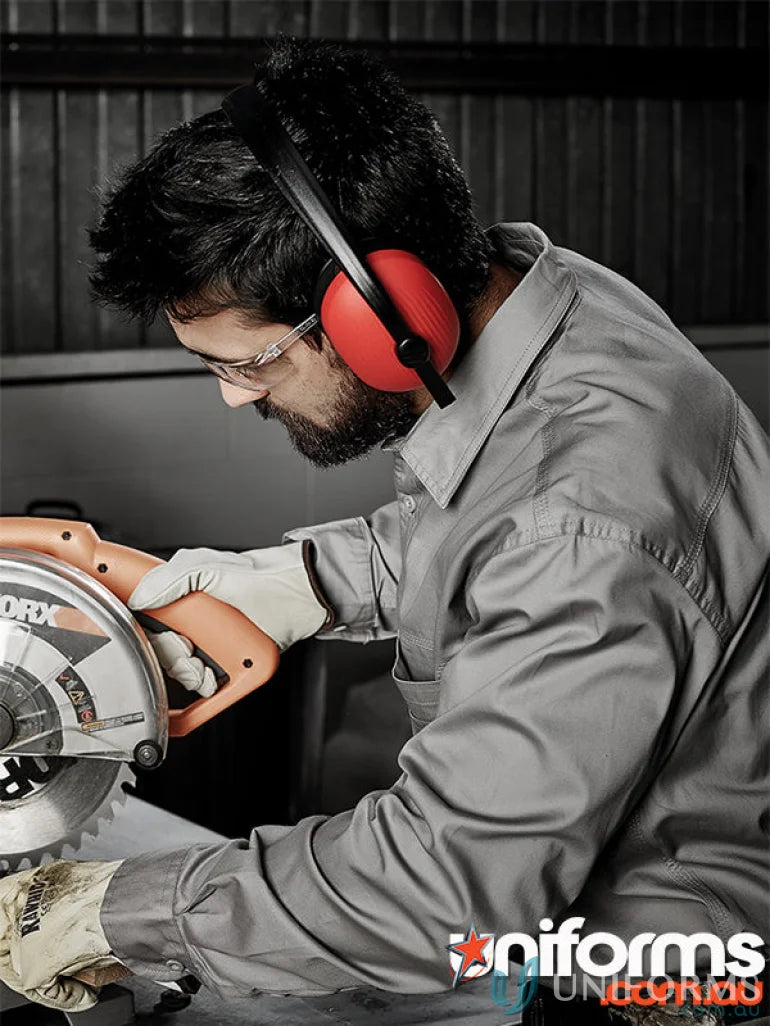 Man in Syzmic mens lightweight tradie long sleeve cotton twill shirt using circular saw safely