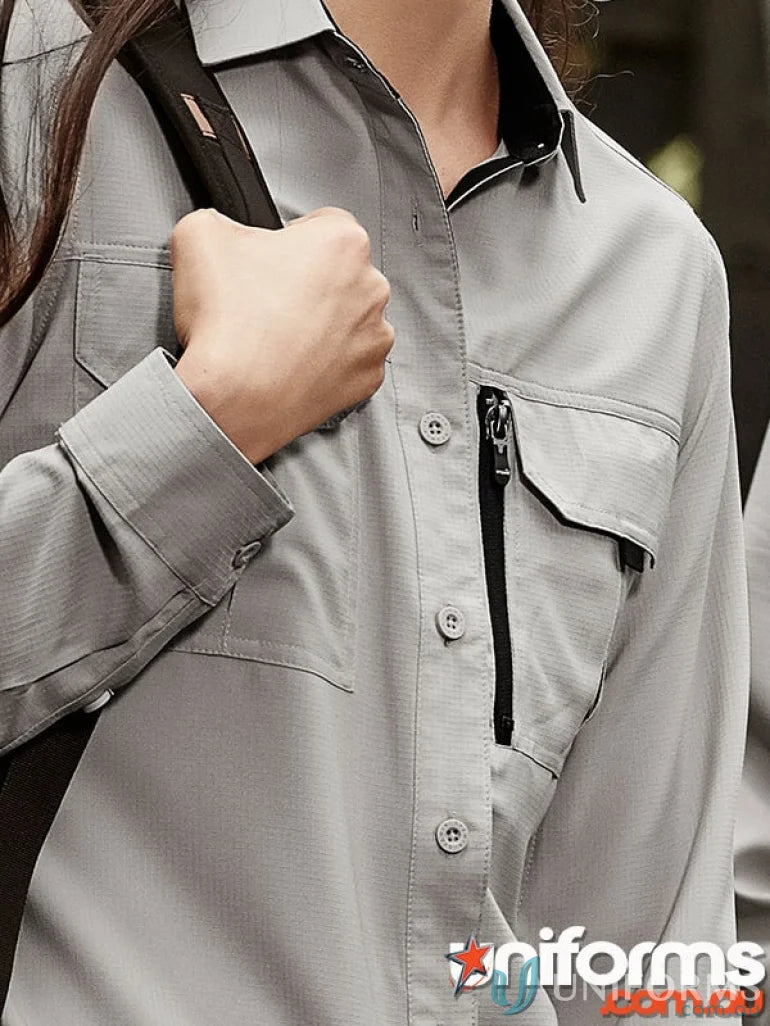 Syzmik Women’s Outdoor Long Sleeve Shirt with zip pocket, ideal for outdoor adventures
