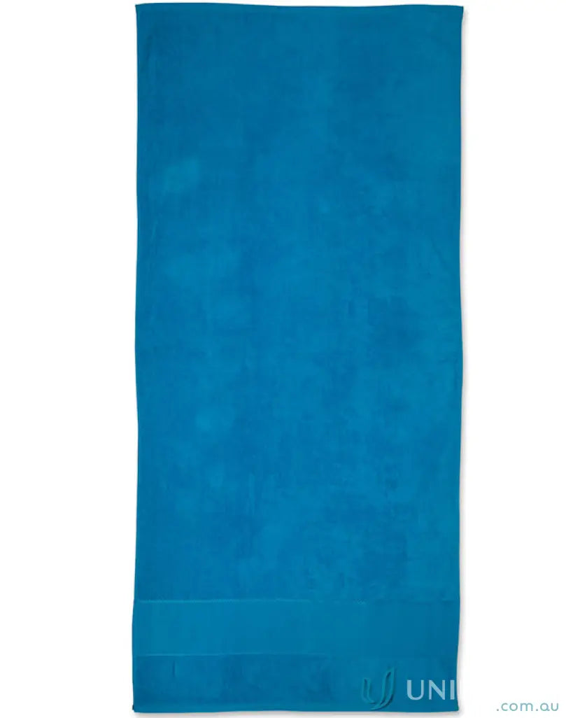 Blue terry velour beach towel perfect for your summer days at the beach