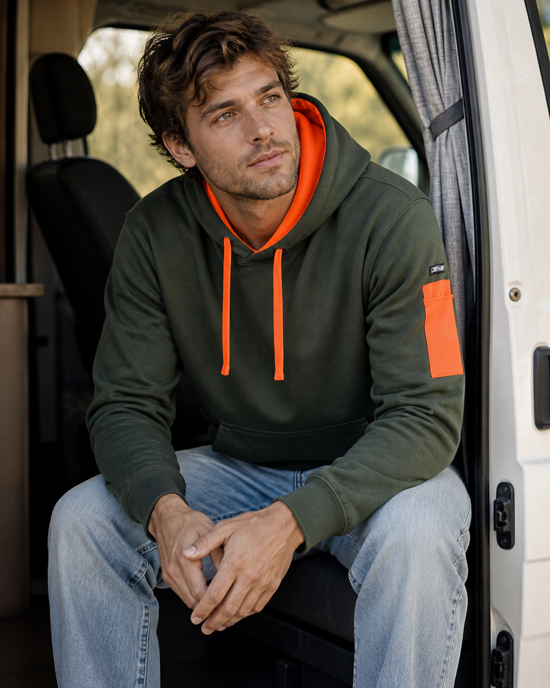 Olive green 350gsm trade hoodie with bright orange lining and patch perfect for durable workwear and uniforms