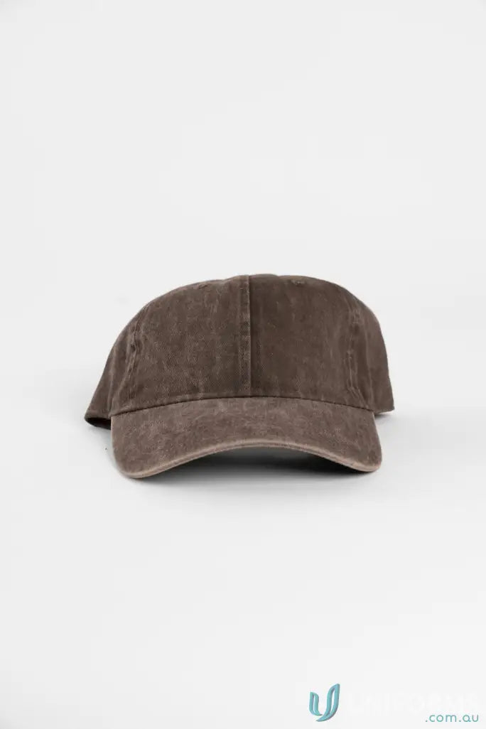 Brown suede baseball cap with adjustable strap and curved brim.