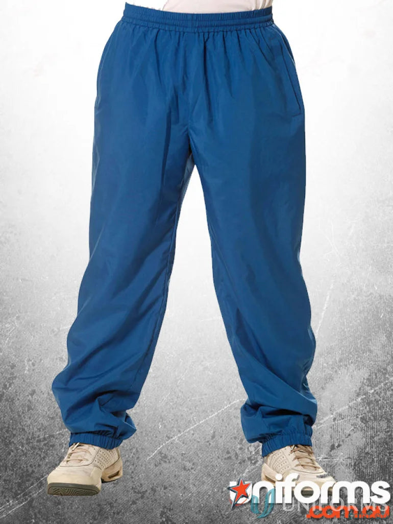 Winning Spirit Kids Legend Warm Up Pants with blue color and zip-up leg openings