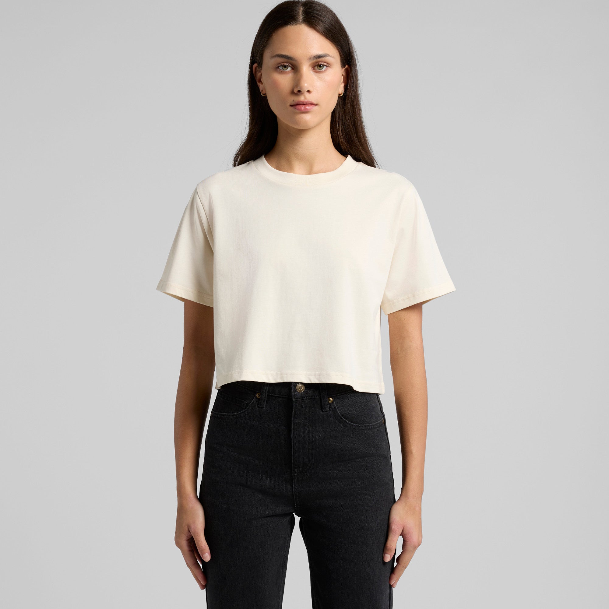 Cream-colored minimalist short-sleeved crop top with round neckline perfect for stylish workwear or casual uniforms