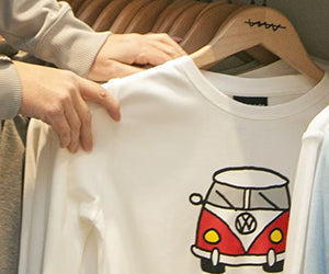 White long-sleeved shirt with red Volkswagen bus graphic for custom uniform printing at Uniform Super Store