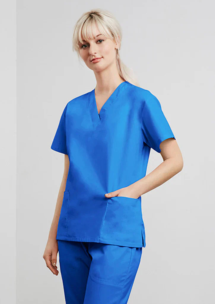Woman wearing blue beauty scrubs, perfect for dental coats and pharmacy uniforms