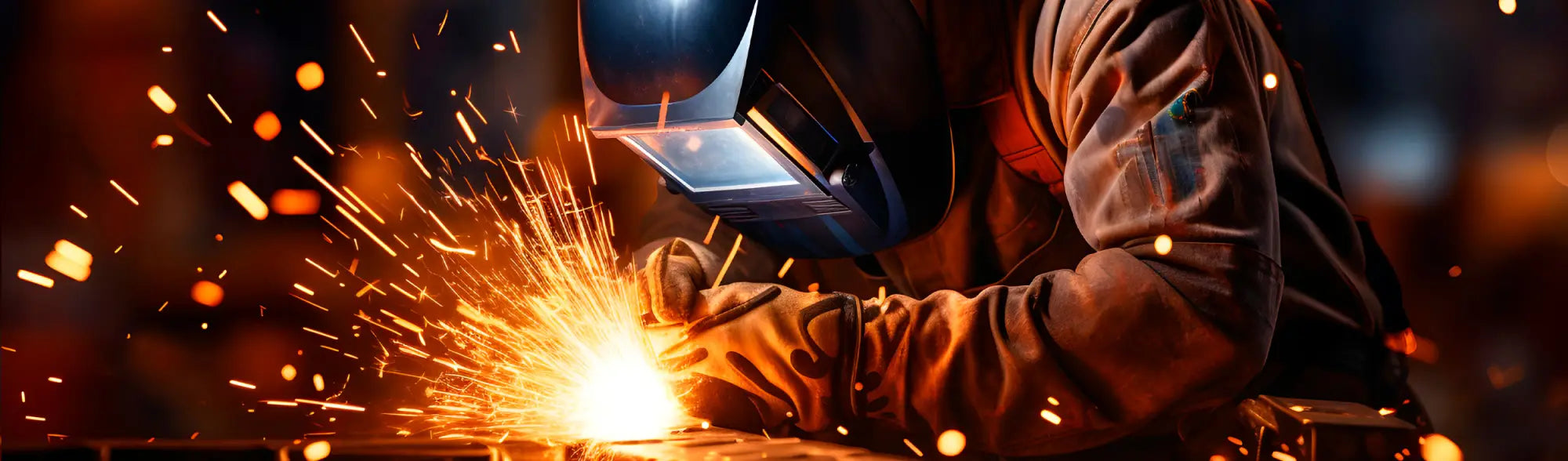 Welder with protective gear sparks flying showcasing welding protection gearand safety tips