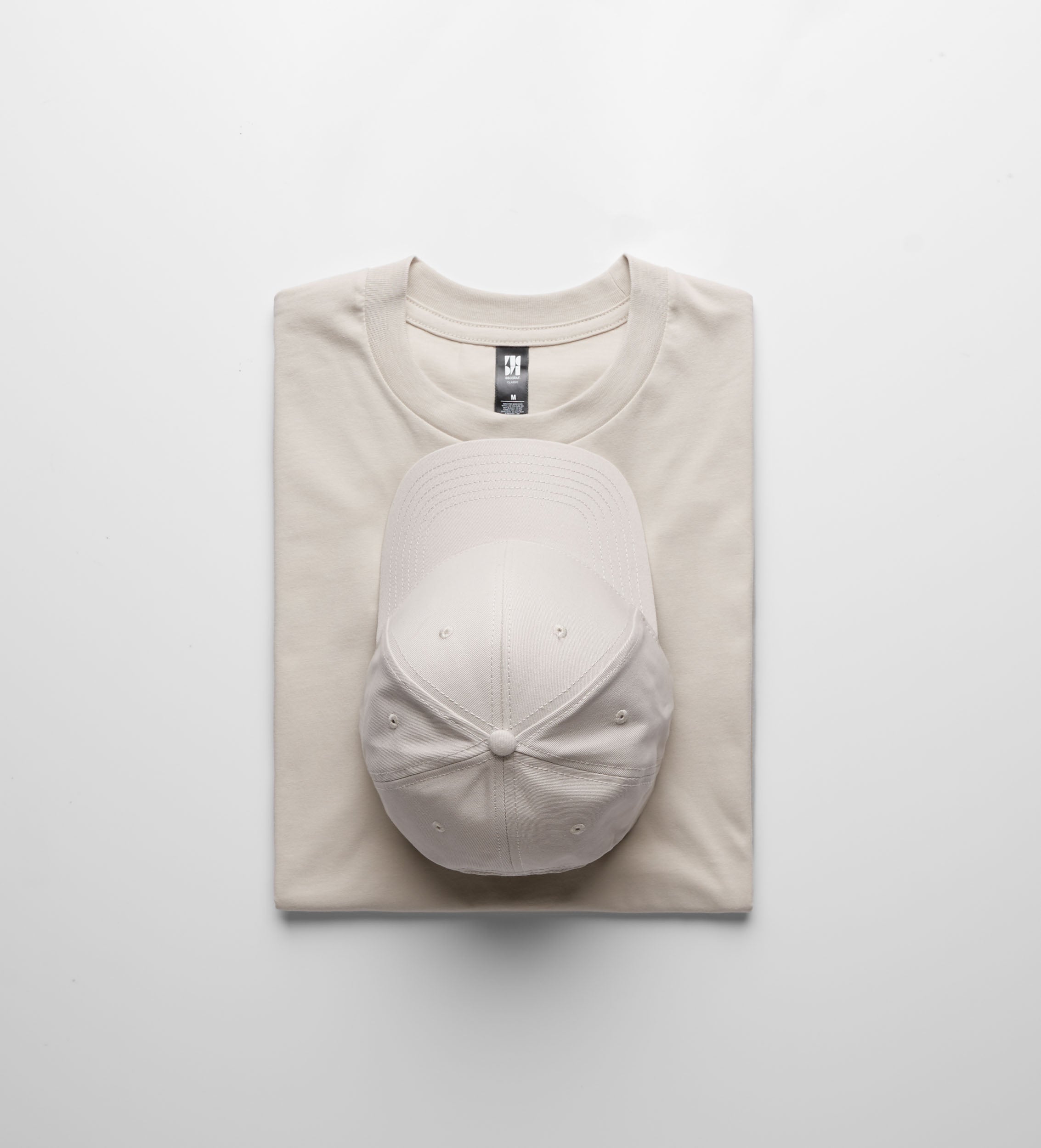 A beige cotton classic heavyweight t-shirt with subtle stitching and matching cap perfect for workwear uniforms