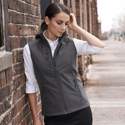 Dark gray aussie pacific ladies chariot soft shell vest with front zipper and side pockets ideal for work uniforms