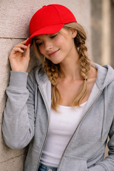 A vibrant red pique mesh cap with structured crown and curved brim perfect for work uniforms and workwear
