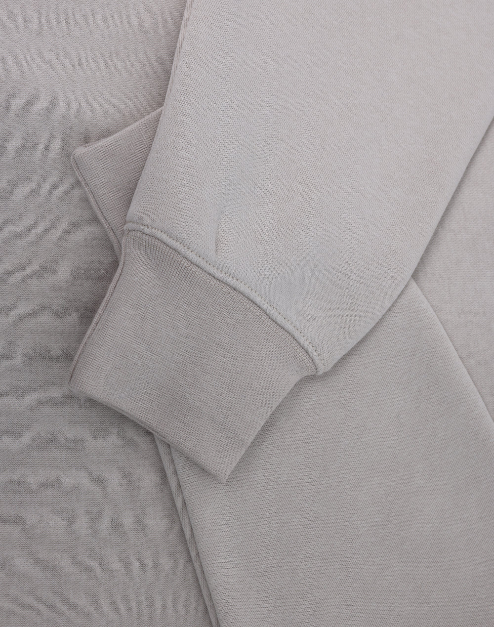Light gray half zip fleece jumper sleeve with ribbed cuffs soft fabric ideal for workwear and uniforms