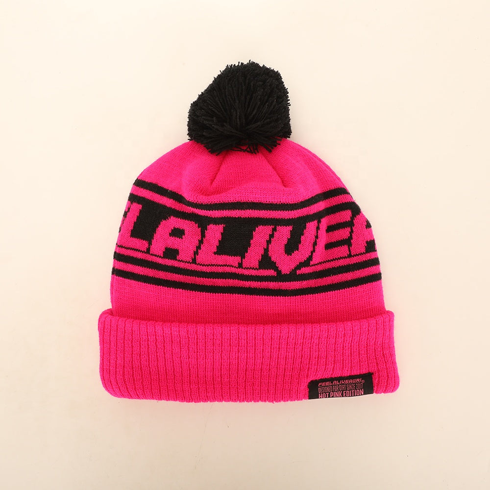 Vibrant hot pink knitted pompom beanie with bold black lalivea lettering, perfect for workwear and uniforms